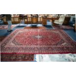 Large Red Ground Persian Mashad Carpet, floral medallion design, measures 380 x 308.