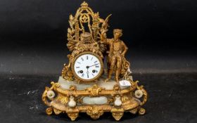 A French Gilt Metal Mantle Clock, white porcelain dial, Roman numerals, surmounted with a well