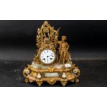 A French Gilt Metal Mantle Clock, white porcelain dial, Roman numerals, surmounted with a well