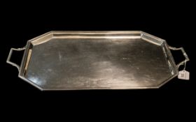 An Early 20th Century Silver Plated Rectangular Tray, with canted corners, with reeded edge and twin