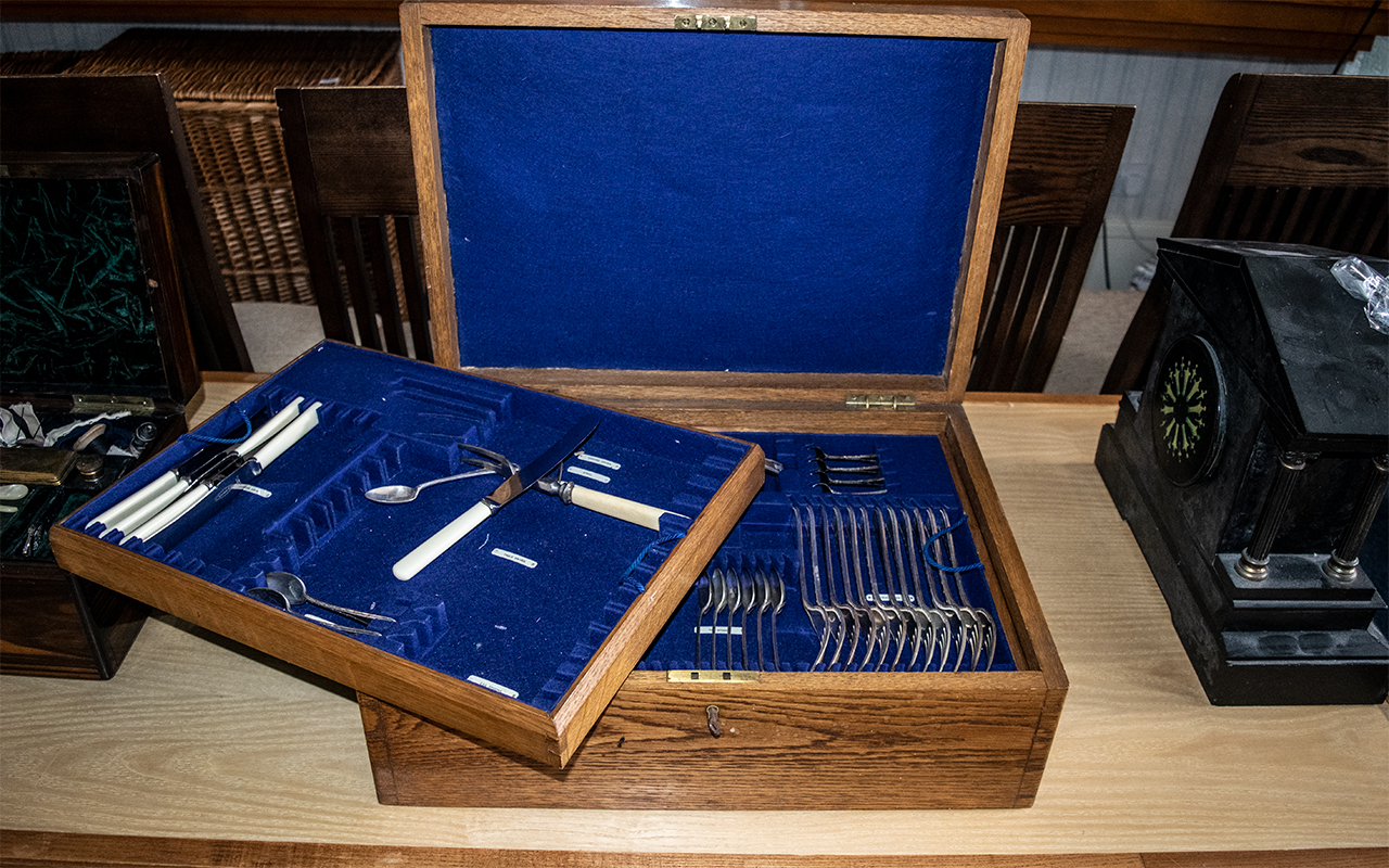 Early 20th Century Oak Cased Canteen of Cutlery, hinged top with two lift out compartments,