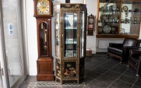 A Chinoiserie Decorated Cabinet, with two glass shelves, bevelled glass front and sides,