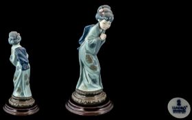 Lladro - Hand Painted Porcelain Figure ' Sayonara ' Model 4989. Issued 1978 - 1996. Height 10.25