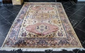 Large Wool Rug, beige ground with Llama design and geometric decoration. Approx. 9' x 6'.