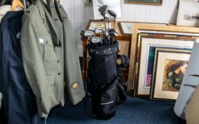 Set of Golf clubs (Irons 3-9) together with sand and pitching wedge, putter and 1, 3 and 5 woods,