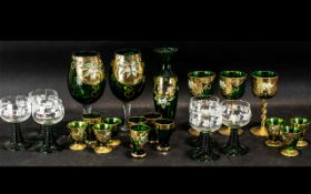 Collection of Venetian Glass, green glass overlaid in gilt, comprising eleven liqueur glasses,