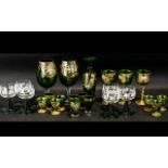 Collection of Venetian Glass, green glass overlaid in gilt, comprising eleven liqueur glasses,