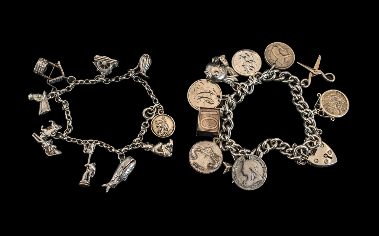 Two Excellent Sterling Silver Charm Bracelets Loaded with (19) Charms some interesting ones with