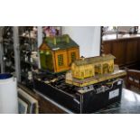 A Hornby Tin Plate Train Set to include a station, engine shed, various platforms,