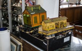 A Hornby Tin Plate Train Set to include a station, engine shed, various platforms,