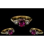 18ct Gold and Platinum Ruby and Diamond Set Ring. Marked 18ct and Platinum to Interior of Shank.