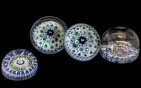 Collection of Four Millifiore Glass Paper Weights, odd chips to edges.