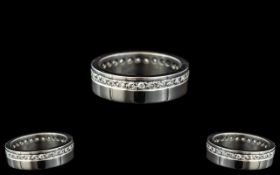 A Platinum Diamond Full Eternity Ring set with round, modern, brilliant cut diamonds. Ring size L,