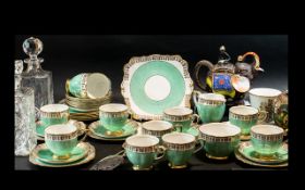 'Bell China' Fine Bone China Tea Service, comprising eleven cups, twelve saucers,