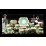 'Bell China' Fine Bone China Tea Service, comprising eleven cups, twelve saucers,