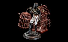 Blackamoor Bronze Figure ( The Bird Seller ) Late 19th Early 20th Century Bronze Figure of a Man
