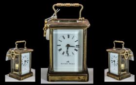 A Brass Carriage Clock white dial with Roman numerals marked Matthew Norman