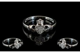 Diamond Set Claddagh Ring, the two clasping hands, representing friendship, here holding a crowned