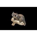 Beswick Racoon No. 2194, marked Beswick to base. Measures 4" x 5".