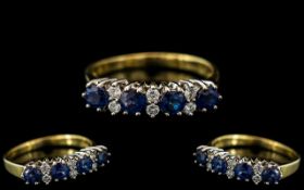 18ct Gold - Attractive Contemporary Designed Diamond and Sapphire Set Dress Ring.