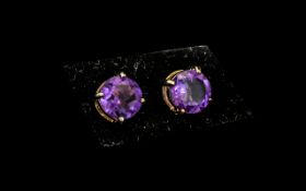 Amethyst Pair of Stud Earrings, round cut solitaires of a beautiful, rich tone of amethyst,