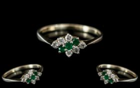 Ladies - Petite 18ct Gold Diamonds and Emeralds Set Ring. Hallmarked for 750 - 18ct.