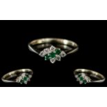 Ladies - Petite 18ct Gold Diamonds and Emeralds Set Ring. Hallmarked for 750 - 18ct.