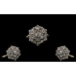 Ladies 18ct Gold Diamond Set Cluster Ring Flowered Setting marked 18ct to interior of shank.