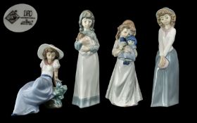 Nao by Lladro Collection of 4 Hand Painted Porcelain Figurines. Depicts 4 Young Girls In Various