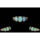 Ladies 9ct Gold Attractive 3 Stone Opal Set Ring - Gallery Setting. Marked 375 to Interior of Shank.