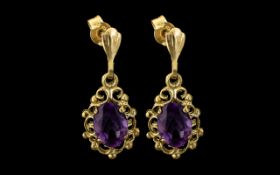 Antique Pair of Attractive 9ct Gold Amethyst Set Drop Earrings.