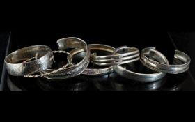 A Fine Collection of Sterling Silver Bangles, Various Shapes / Designs. All Fully Hallmarked for