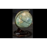A Mid 20th Century 7" Terrestrial Globe on Stand, made of tin.
