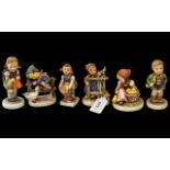 Collection of Five Hummel Figures, to include Little Helper, School Girl, Trumpet Boy,