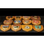 Collection of Twelve Wooden Shields, Royal Air Force, Kings Arms, Royal Columbia and others.