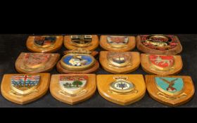 Collection of Twelve Wooden Shields, Royal Air Force, Kings Arms, Royal Columbia and others.