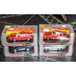 Collection of Four Boxed Burago Diecast Models, comprising a Porsche 959 turbo, a Ferrari GTO 1984,