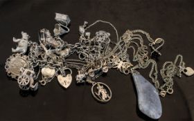 Collection of Silver Jewellery to include a charm bracelet, earrings, pendant and chain, etc.