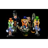 Four Murano Glass Clowns, tallest 11", together with two glass bird ornaments, approx 10" tall.