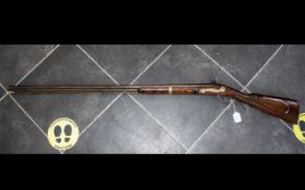 A 19th Century Percussion Riffle walnut stock steel trigger guard and 39 1/4 inch barrel,