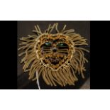 A Vintage Dominique Lion Brooch. Crafted in gold plated metal and crystals.