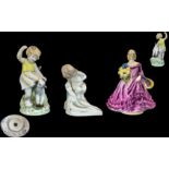 Royal Worcester - Fine Trio of Small Hand Painted Figures. Comprises 1/ Months of the Year ' April '