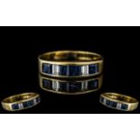 Ladies 18ct Gold - Attractive Contemporary Diamond and Sapphire Channel Set Ring.