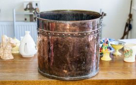 Arts & Crafts Copper & Brass Coal Bucket, with riveted strapwork and swing handle.