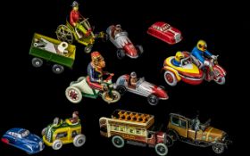 A Good Collection of Wind Up Tin Toys.