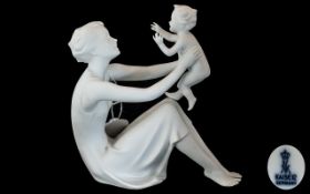 Kaiser Porcelain Bisque figure 'Mother & Child'. Height 8.5". Marked to base 398, Kaiser, Germany.