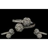 Ladies - Superb Quality and Attractive 18ct White Gold Diamond Set Crossover Cluster Dress Ring.