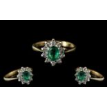 Ladies Attractive 9ct Gold Petite - Emerald and Diamond Set Ring, Flower head Setting.