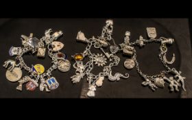 Three Vintage Sterling Silver Charm Bracelets loaded with 40 silver charms all marked for Sterling