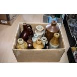 Collection of Stoneware Bottles, 12 in total, various shapes, sizes and colours.